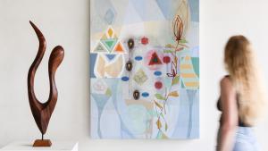 Michael Barringer with model and morgan robinson sculpture on stand