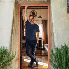 man standing in doorway 