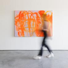 brenda zappitell painting with person walking in front of it 