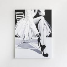 A monochrome painting from Sunday Selects depicts a person sitting on a modern chair, dressed in a light-colored long-sleeved shirt and a tutu skirt. They are adjusting their high-heeled shoe. The artwork, crafted by talented artists, focuses on the lower 