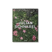 The cover of the book "Julian Schnabel" by Taschen features a lush, green leafy background with scattered pink flowers. The title "JULIAN SCHNABEL" appears prominently in white capital letters across the center,a perfect addition to art lover's library. 