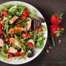 Image of Farro, Kale, and Strawberry Salad with Bacon and Chili-Dusted Pepitas 