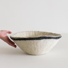 Wool Felt Orbit Bowl held by a female hand