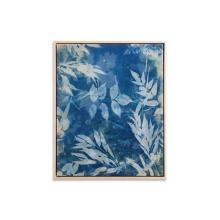 Someday Soon by Kristen Abbott A framed cyanotype print titled "Someday Soon" features white botanical leaf silhouettes against a deep blue background. The leaves are arranged organically, creating a delicate and natural pattern. The thin, light-colored frame complements the artwork beautifully.